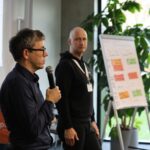 Person speaking into a microphone